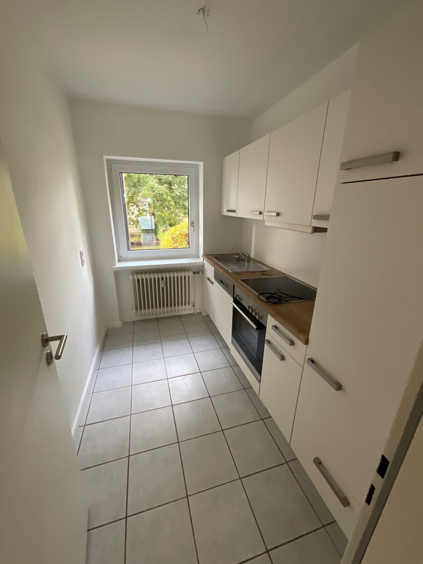 3-Zimmer-Wohnung mit Balkon und Einbauküche im Hochparterre